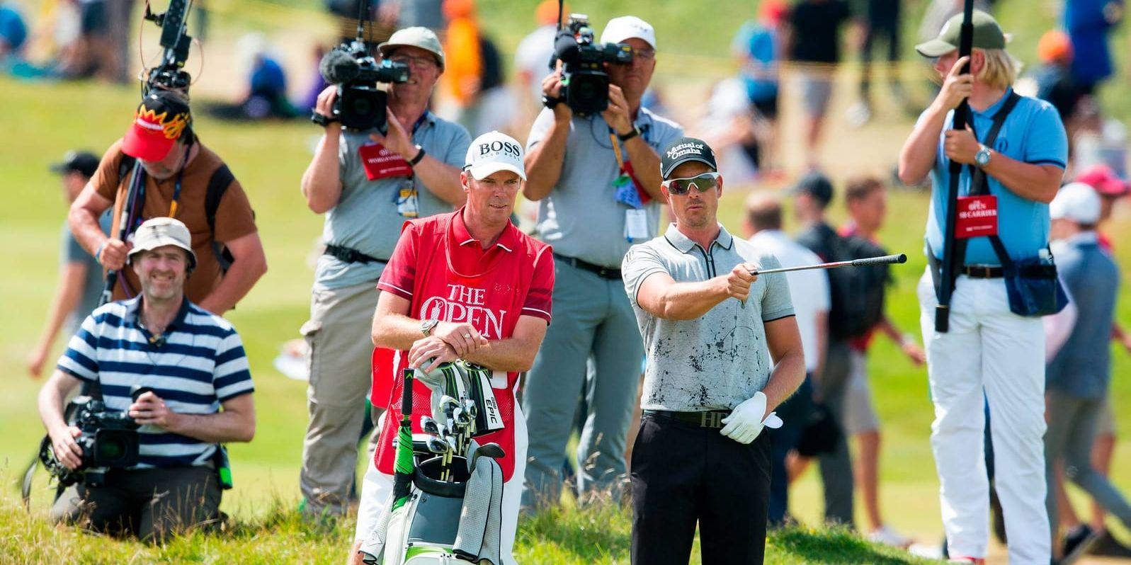 Henrik Stenson med caddien Gareth Lord under British Open. Arkivbild.